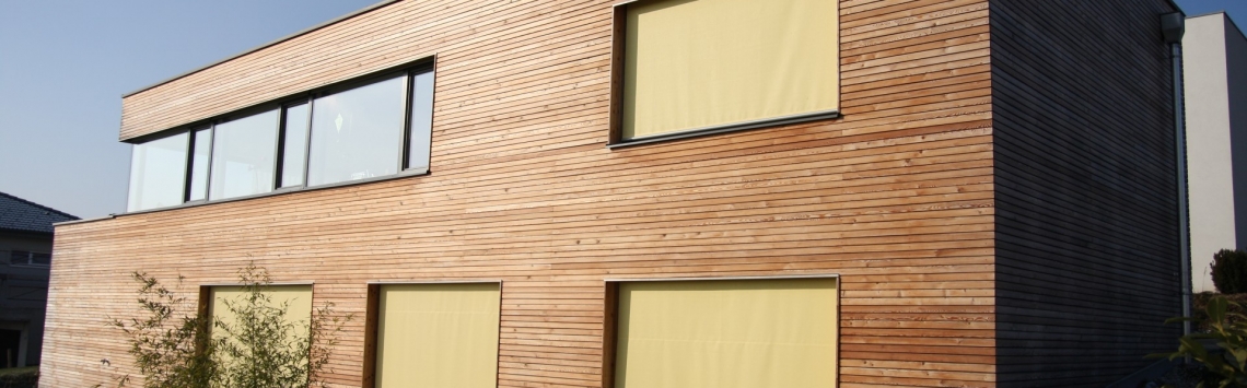 Fassade Fassade - Holzfassade - Frontfassade - Holzdesign - Zimmerei - Zimmerer - Zimmerei in Mauthausen - Gartenhaus - Holzbau - Wohnhaus - Gemeindezentrum - Zimmerei Hentschläger - Trockenbau Badezimmer - Holzbaupreis - Innenausbau Haus - Holzrahmenbau Kosten - Holzbau Architektur - Fassadenverkleidung Holz Preise - Holzbau rustikal - Holzbauten - Außenfassade Holz - Akustik Trockenausbau - Anbau Holzrahmenbau - Putzträgerplatte außen Holzbau - Vorgehängte Holzfassade - Fassade - Holzdesign - Holzbau - Holzfassade - Holz-Riegel-Wände - Dachstuhl