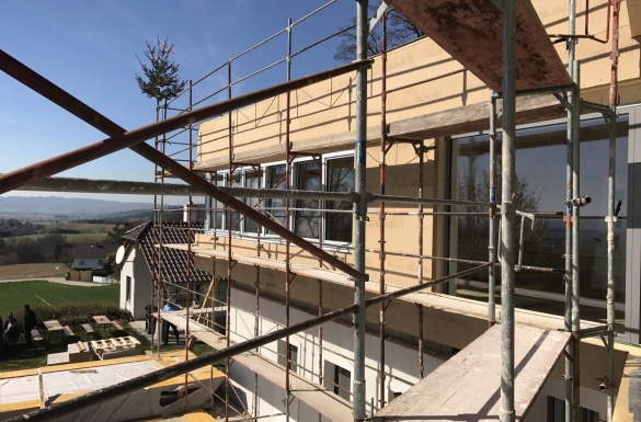 Massivholzbau-Aufstockung in Walding - Hentschläger Holzbau - Zimmerei 