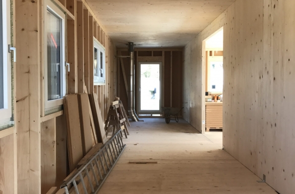 Massivholzbau-Aufstockung in Walding - Hentschläger Holzbau - Zimmerei 