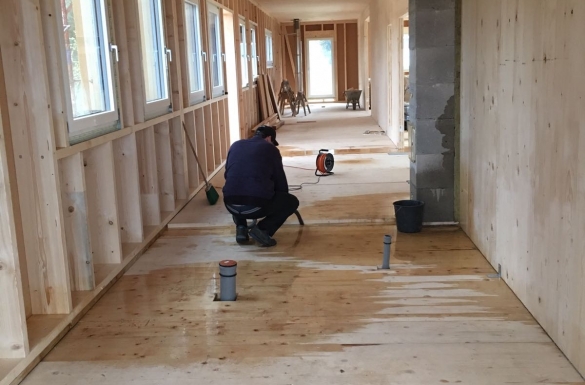 Massivholzbau-Aufstockung in Walding - Hentschläger Holzbau - Zimmerei 