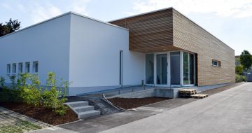 Kinderbetreuungszentrum - Neuromed Campus - Hentschläger Holzbau - Hentschläger Zimmerei - Zimmerei in Mauthausen - Holzfassade