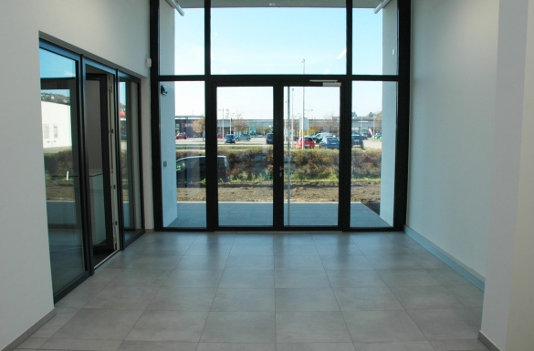 Gewerbebau Firma Kuka Bürogebäude - Hentschläger Bau GmbH - Baufirma in Langenstein