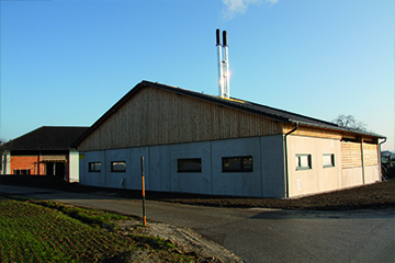 Industriebau - Hentschläger Bau GmbH - Objektbau - bauen - Industrie - Grundidee - Systembau - Hallenbau - Ökologisch bauen